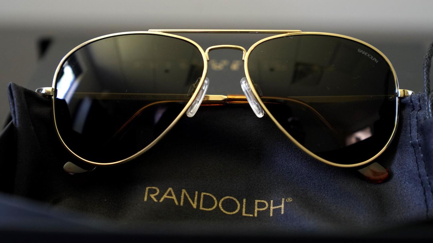 Biden gives Putin pair of Massachusetts made aviators AP News